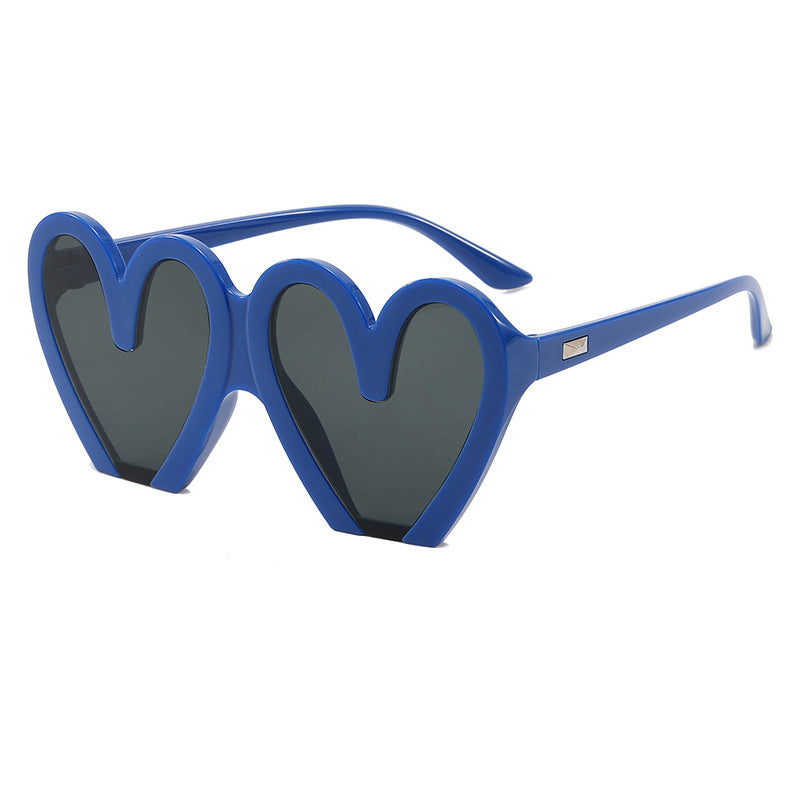 Damen Herzförmige Sonnenbrille mit auffälligem Design Karnz