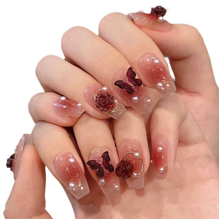 Blumenverzierte Gel-Nagelkunstverlängerungen
