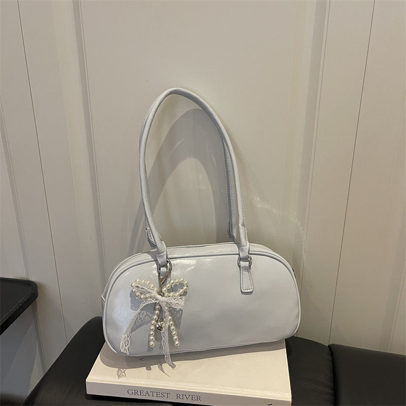 Leder Handtasche mit Patentoberfläche