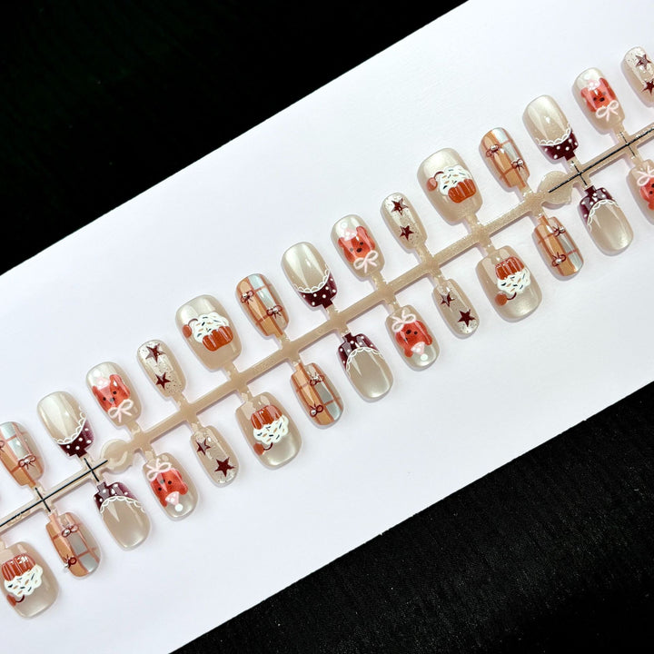 Dekoratives Press-On Nagelkunstset mit Feiertagsmotiven
