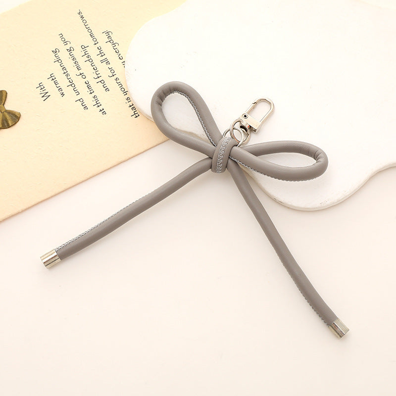 Stylischer Schleifen-Knoten Schlüsselanhänger Halter Karnz