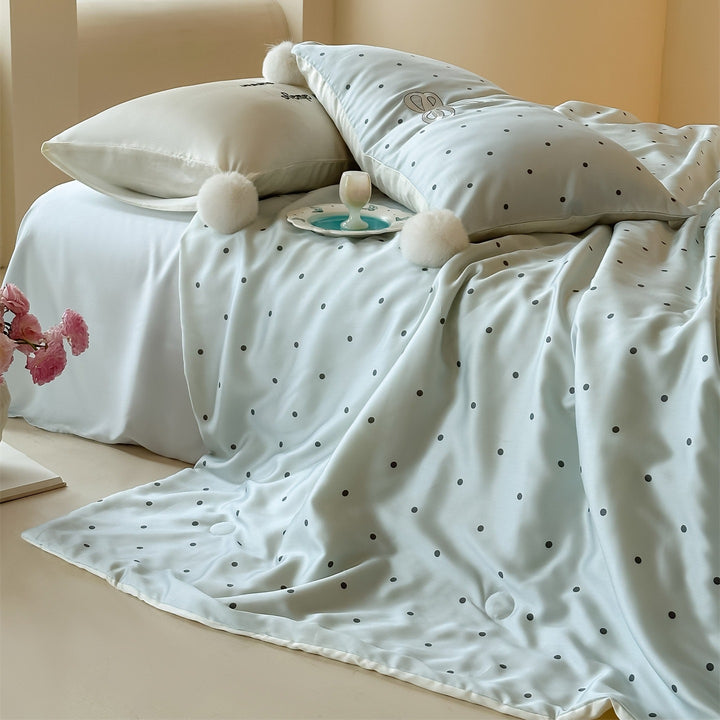 Luxuriöse Satin-Bettwäsche-Garnitur mit Punktmuster und Bommel-Quasten