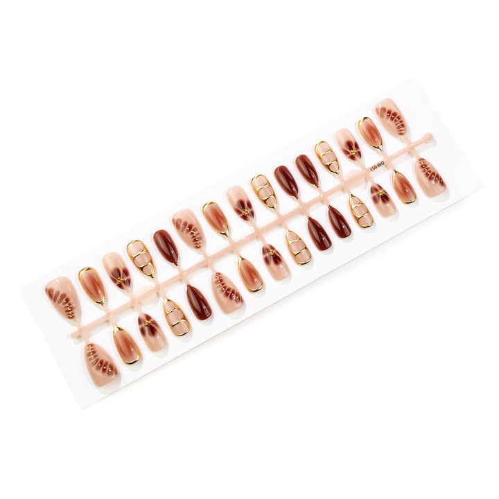 Elegantes dekoratives Press-On-Nail-Art-Set mit goldenen Akzenten Karnz