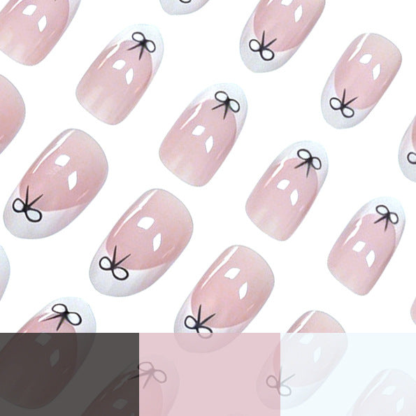 Künstlerische Schleifen-verzierte Nagelkunst Karnz