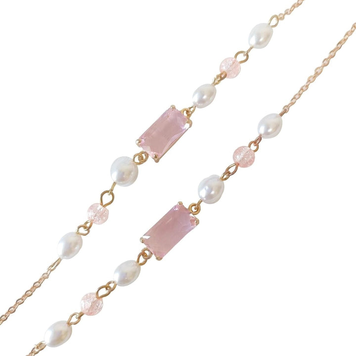 Elegante Schmuckkette mit Perlen und Pinken Akzenten Karnz