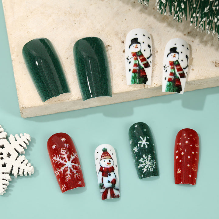 Festliche Kunstnägel mit winterlichen Motiven Karnz
