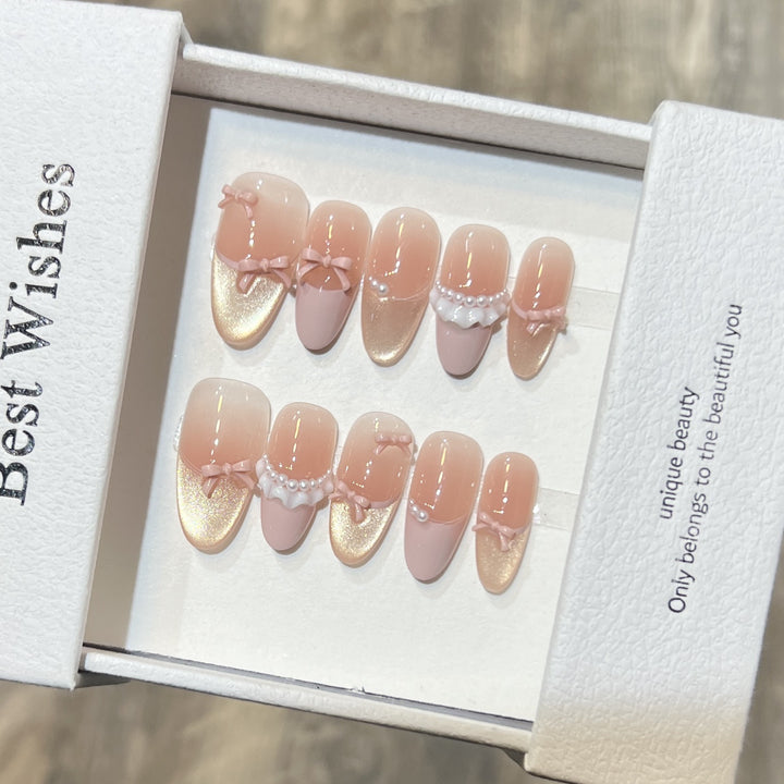 Elegantes Press-On Nagel Kunst Set mit Perlen- und Schleifenakzenten Karnz