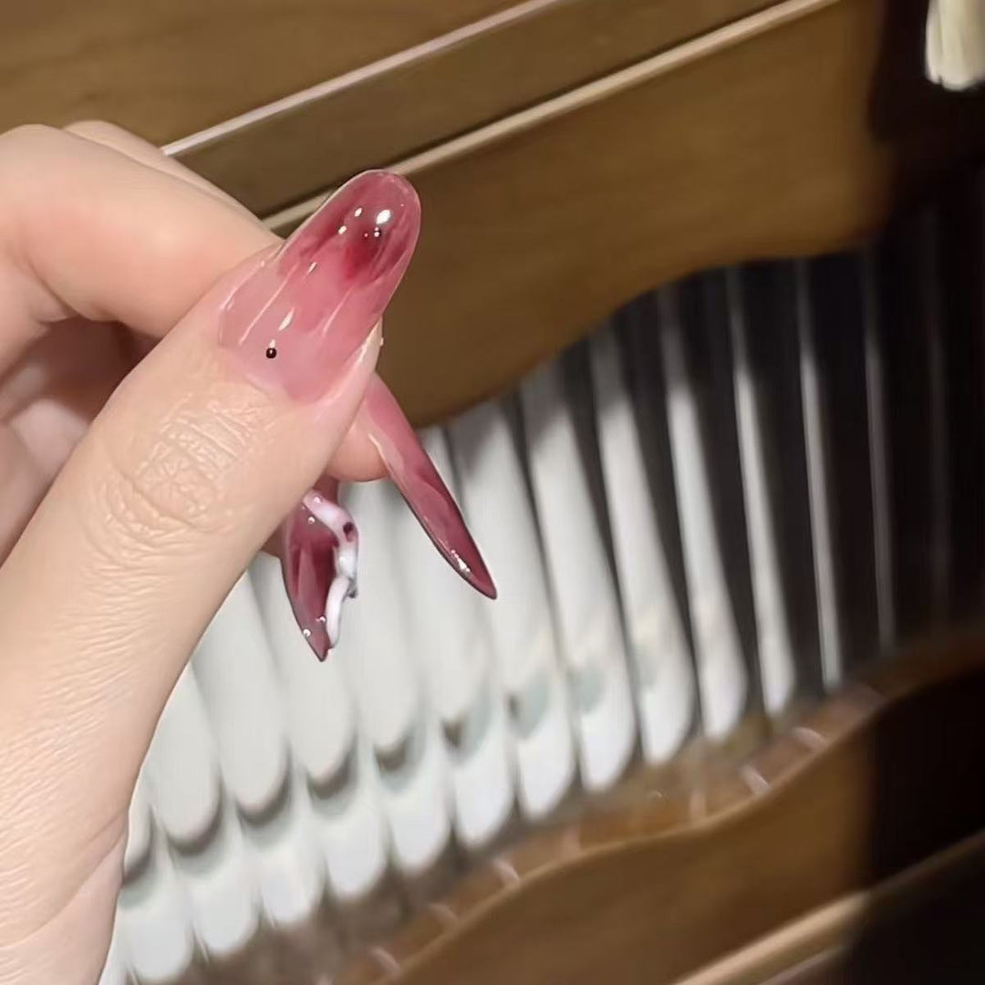 Künstlerische lange Stiletto-Nagelerweiterungen