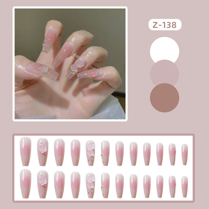 Dekorative Acryl Press-On Nägel mit floralem Akzent