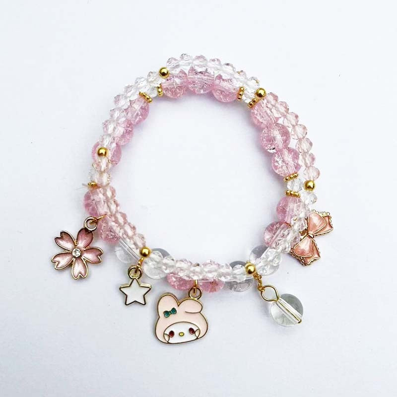 Elegantes Armband mit Tier- und Glitzeranhängern Karnz