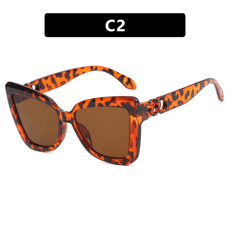 Damen trendige Katzenaugen-Sonnenbrille mit raffiniertem Muster Karnz