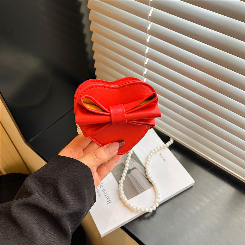 WoHerzförmige Schleifen-Clutch Tasche Karnz
