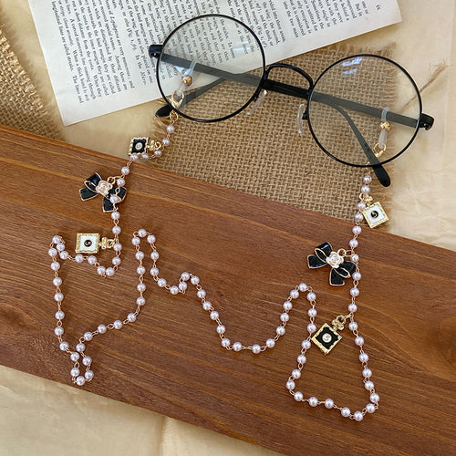 Modische Brillenhalterkette mit Perlen und Anhängern Karnz