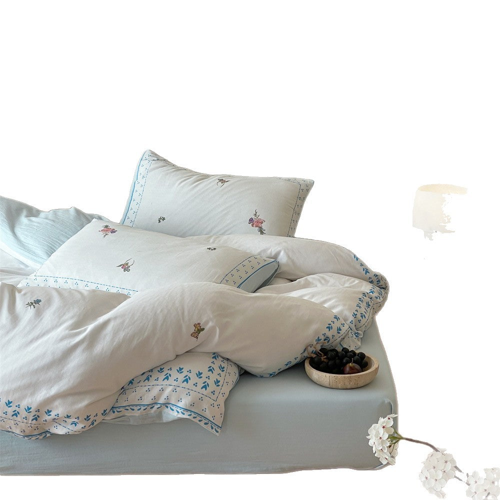 Bestickte Baumwoll-Bettwäsche mit Blumendesign und dekorativem Rand