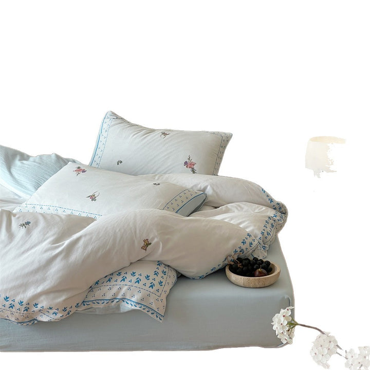 Bestickte Baumwoll-Bettwäsche mit Blumendesign und dekorativem Rand