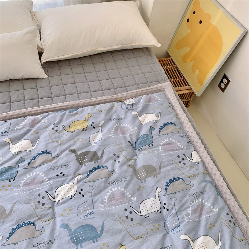 Kinder-Steppdecke mit buntem Dinosaurier-Print und weicher Minky-Borte