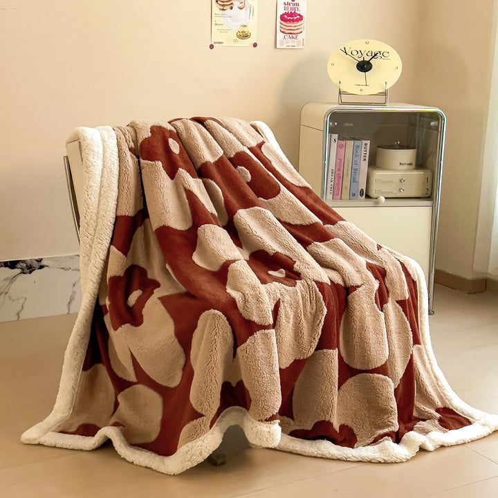 Gemütliche floral gemusterte Fleece-Decke
