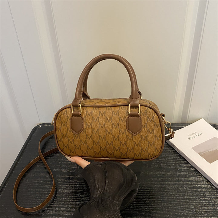 Stylische Monogram-Handtasche