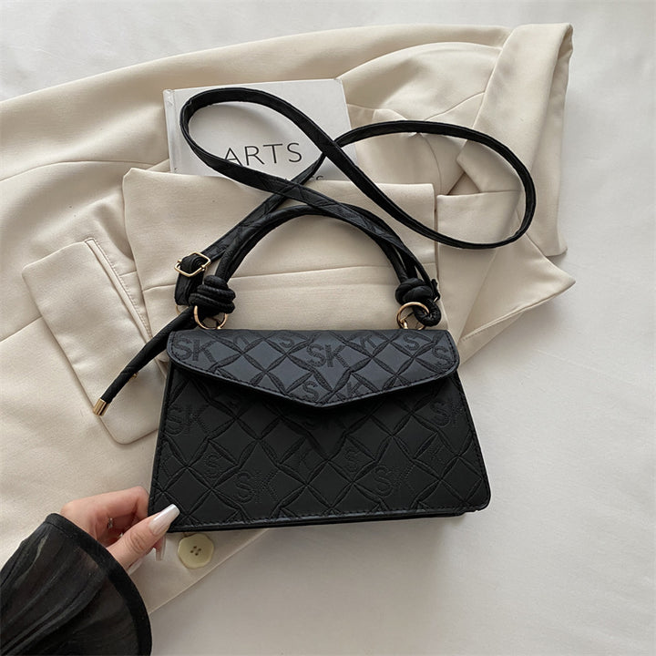 Gepolsterte Handtasche