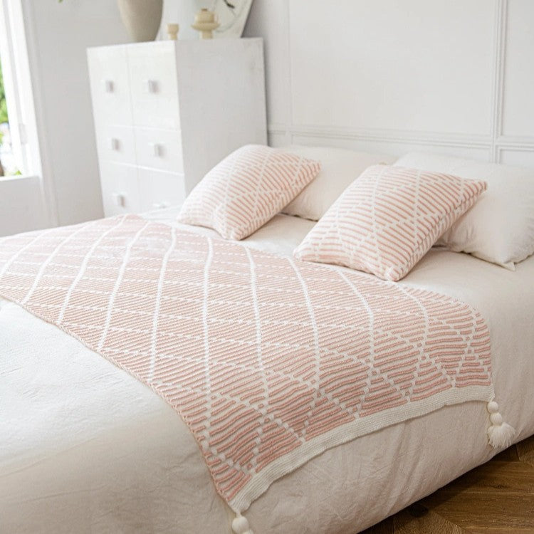 Dekorativer Strickwurfdecke