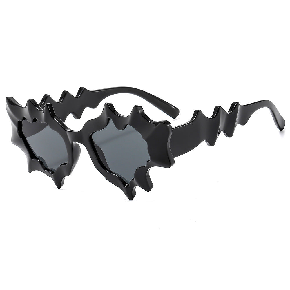 Damen Modische Sonnenbrille im extravaganten Wellen-Design Karnz