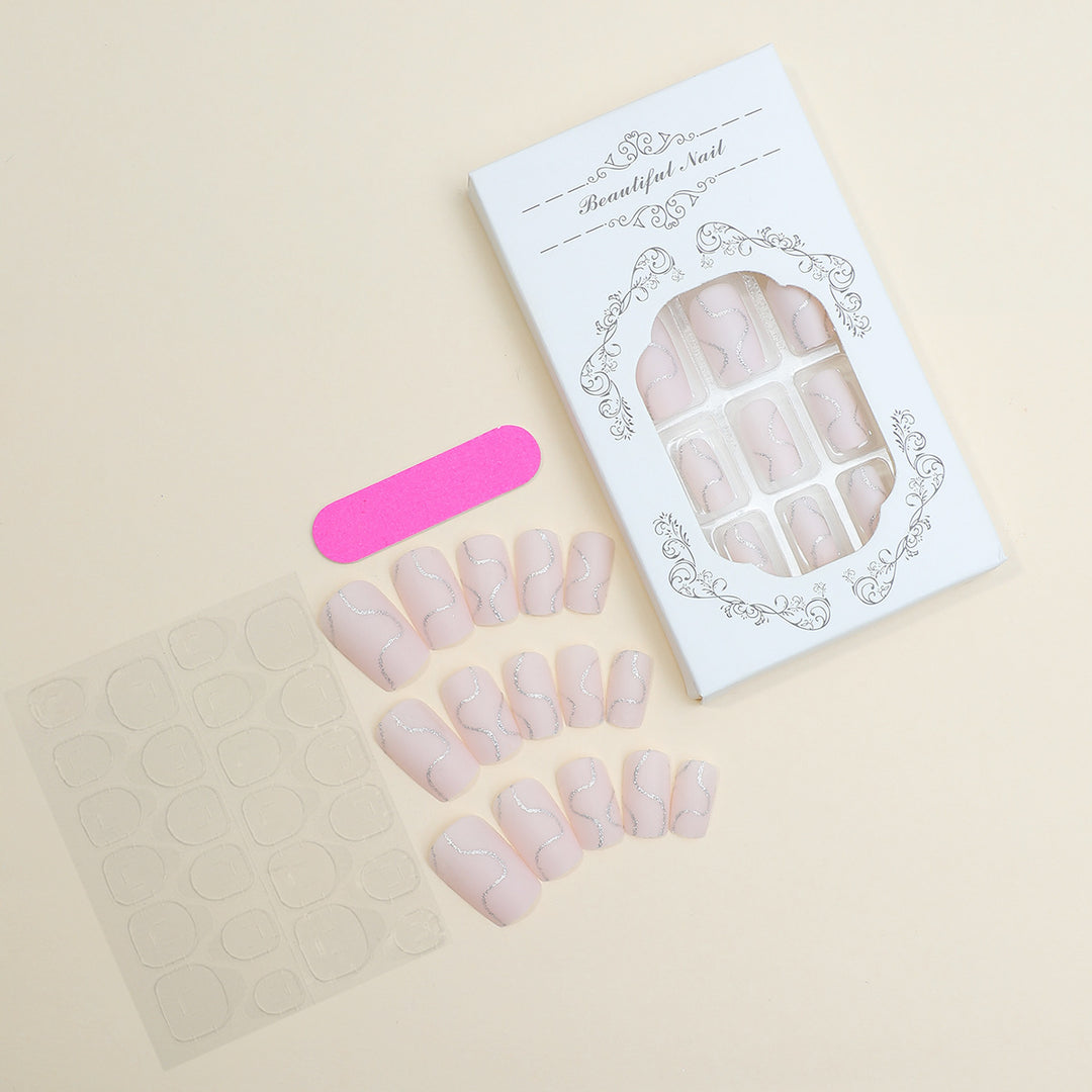 Kunstnagelset mit elegantem Glitter-Konturdesign Karnz