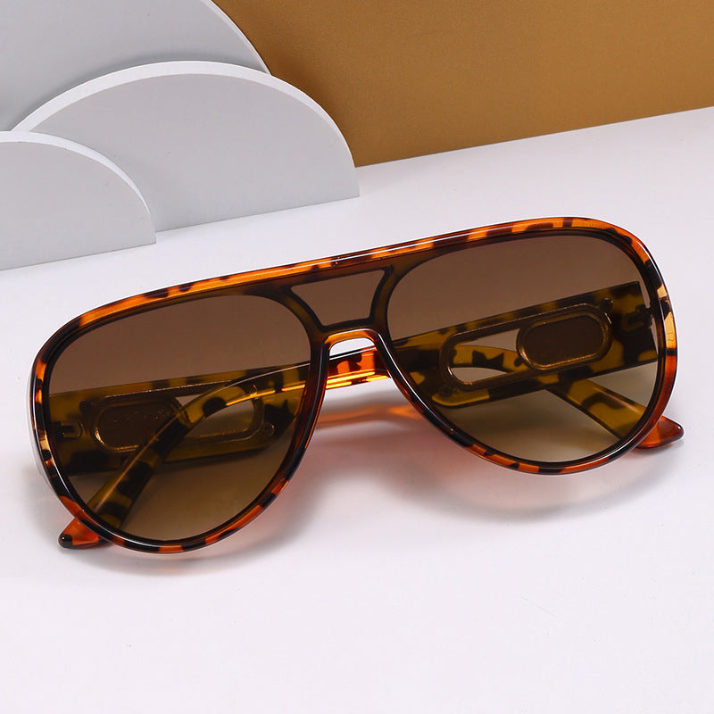 Damen Elegante Oversize-Sonnenbrille mit Designer-Details Karnz