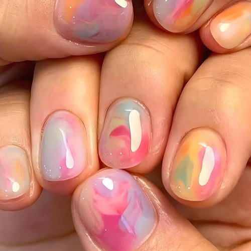 Kunstnagelset mit bunten Marmor-Designs Karnz