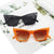 Damen Katzenaugen-Sonnenbrille mit transparentem Rahmen und UV-Schutz Karnz