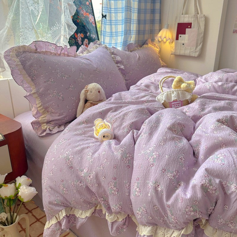 Blumenverziertes Steppbett-Set