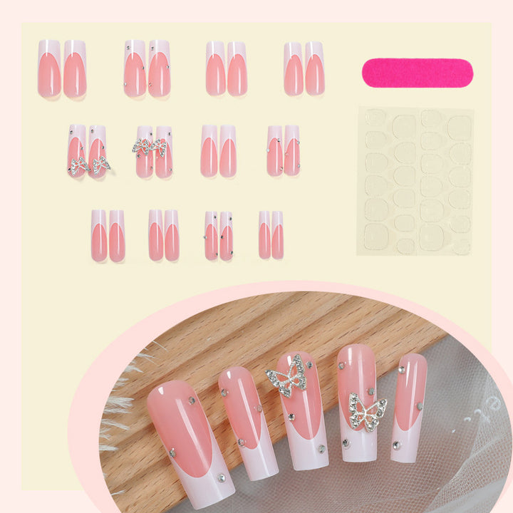 Dekorativer Press-On Nail Kit mit Schmetterlingsakzenten Karnz