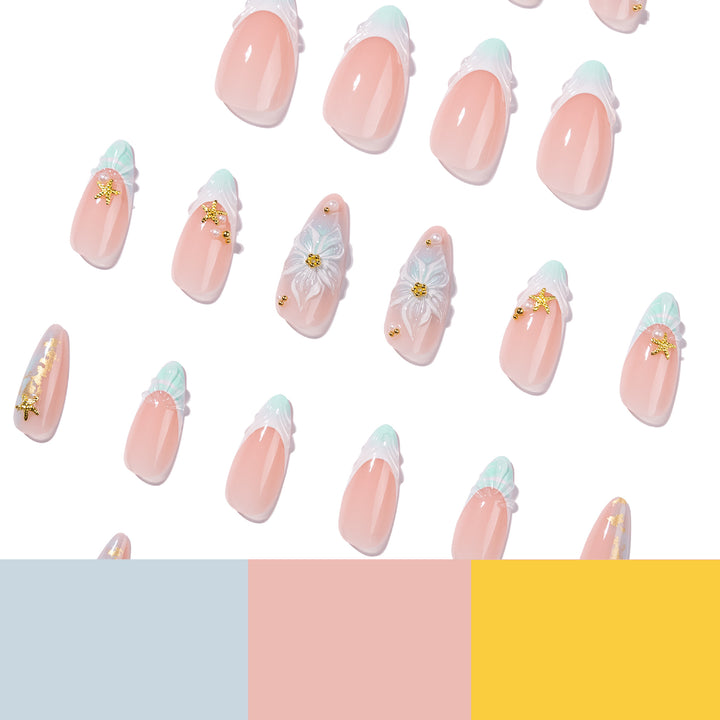 Kunstvolle Stiletto-Nägel mit floralen und glamourösen Akzenten Karnz