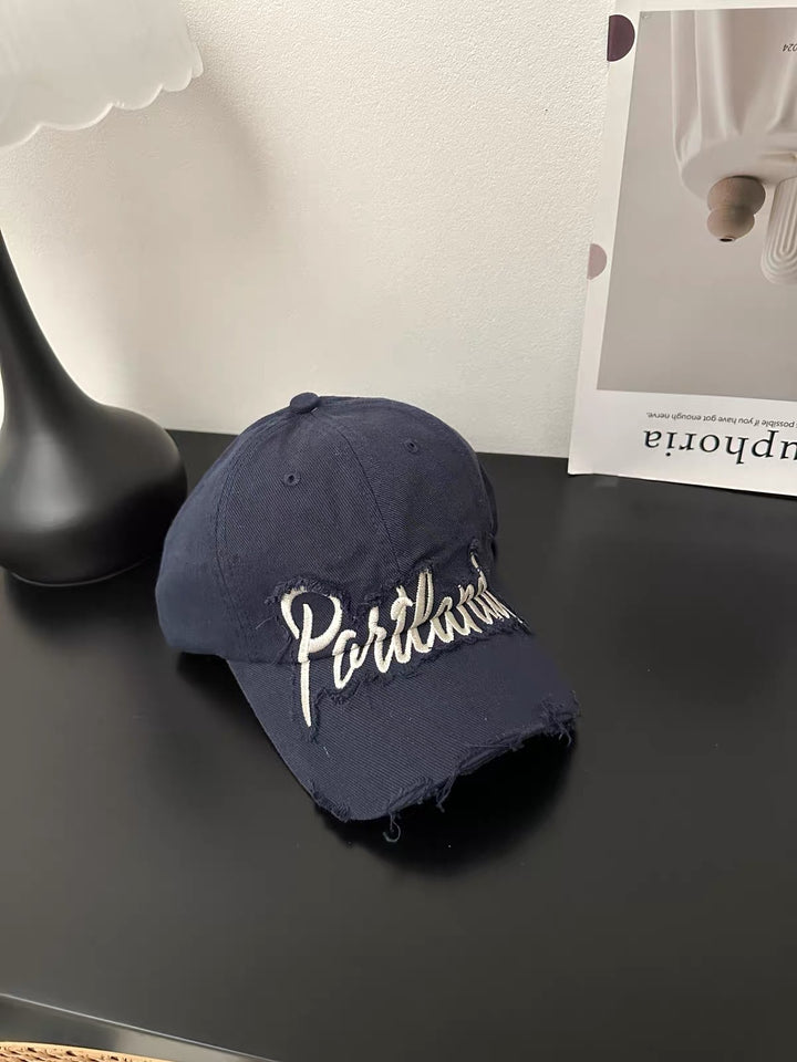 Gealterte Jeans Baseballkappe mit gesticktem Text