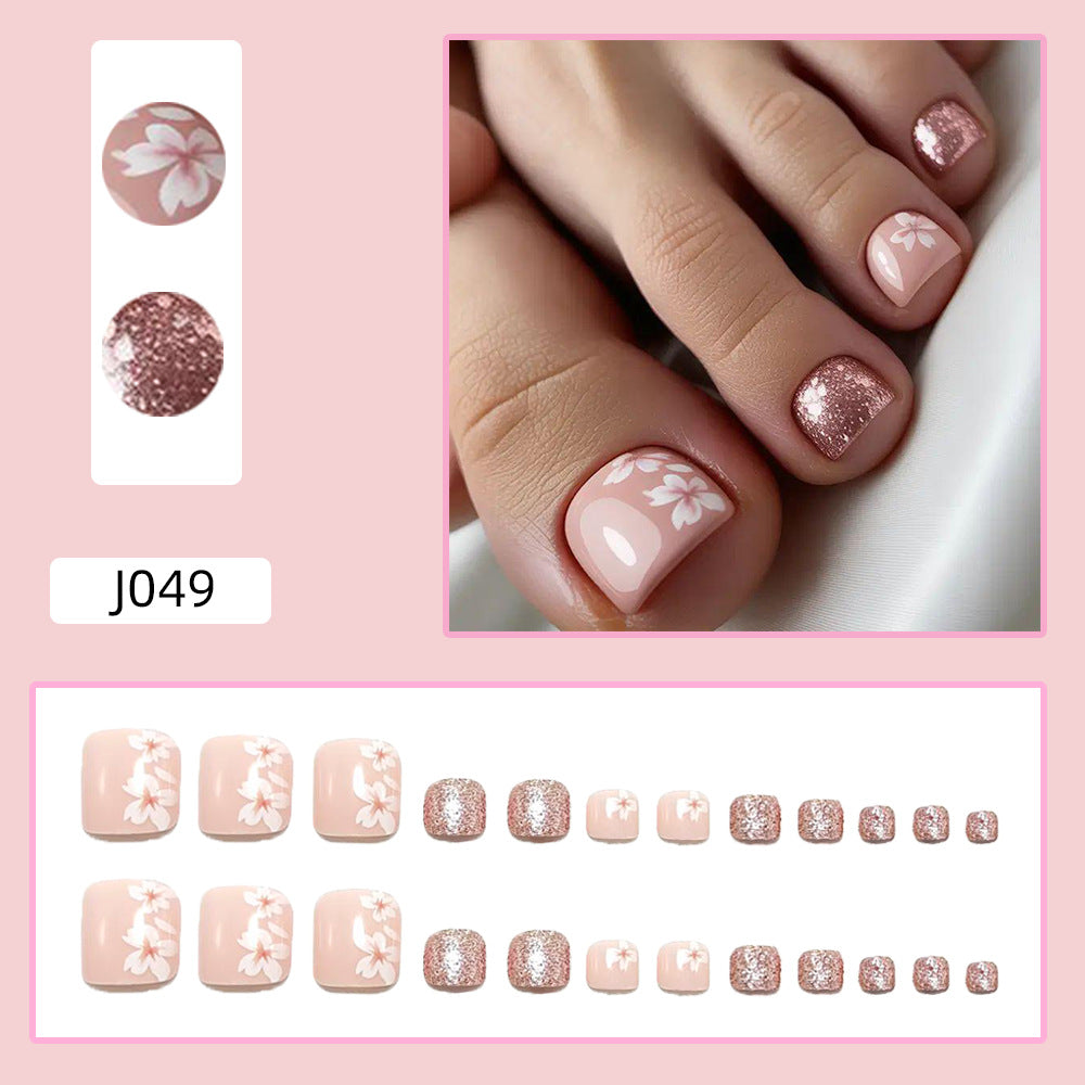 Fußnagelkunst Set mit Elegantem Blumendesign und Glitzerakzenten Karnz