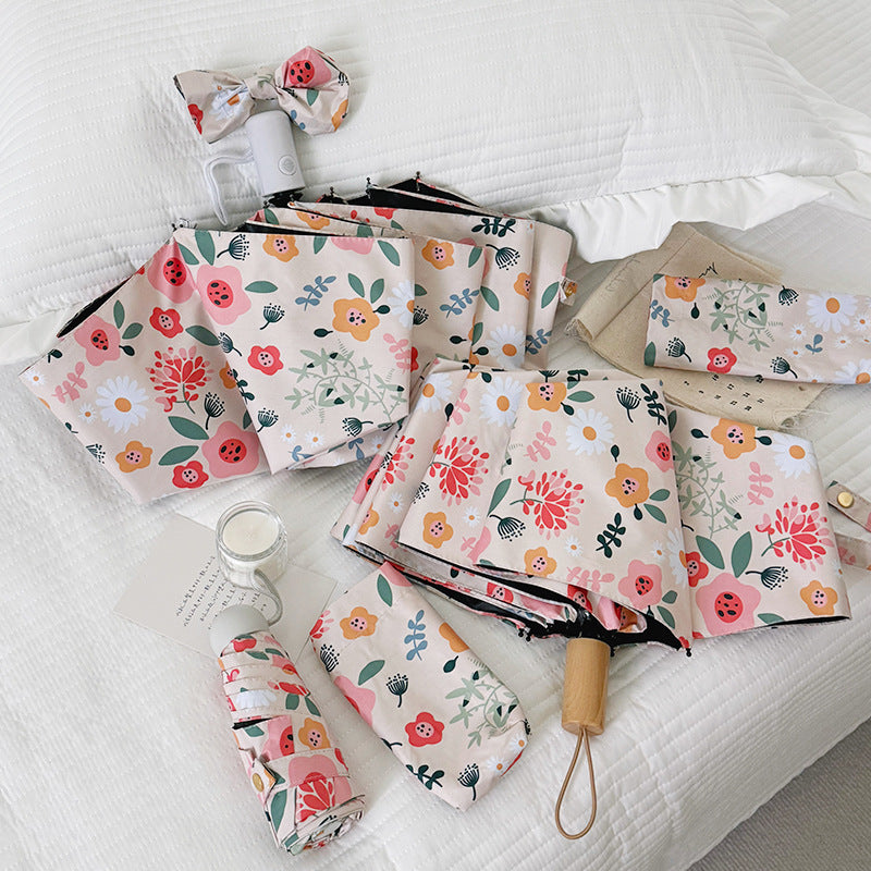Damen Faltbarer Regenschirm mit floralem Design und niedlichen Details Karnz