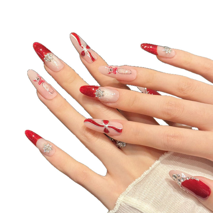 Festliches Nagelkunst-Press-On-Set mit Glitzer und dekorativen Elementen