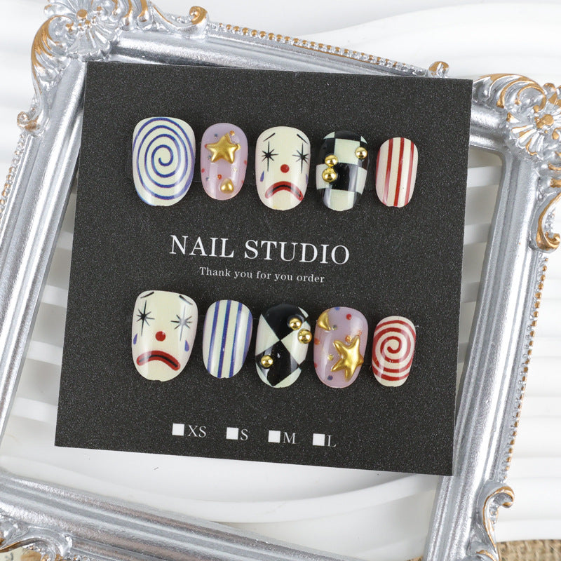 Kunstnagelset mit kreativen Clown- und Sternmotiven Karnz