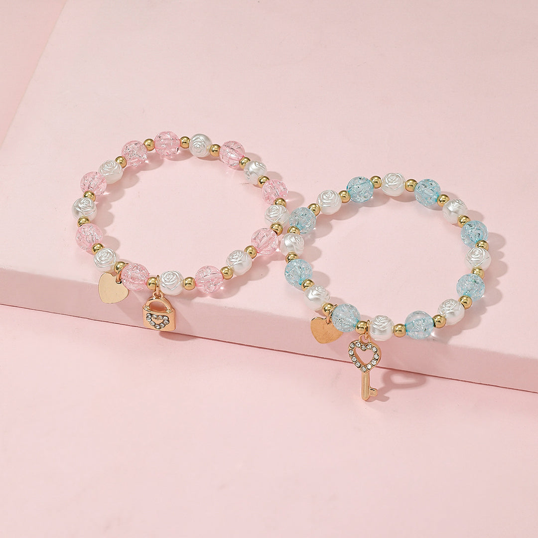 Verspieltes Armbandset mit Herz- und Schlüsseldesign Karnz