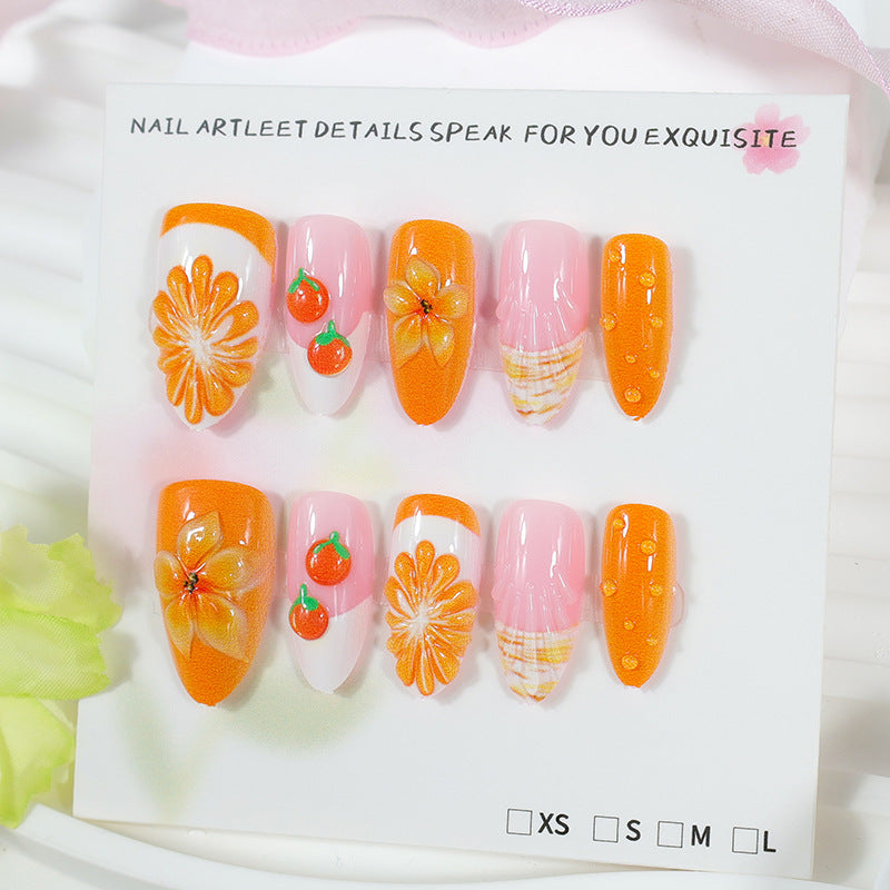 Kunstnagelset mit fruchtigen Motiven und glamourösen Akzenten Karnz