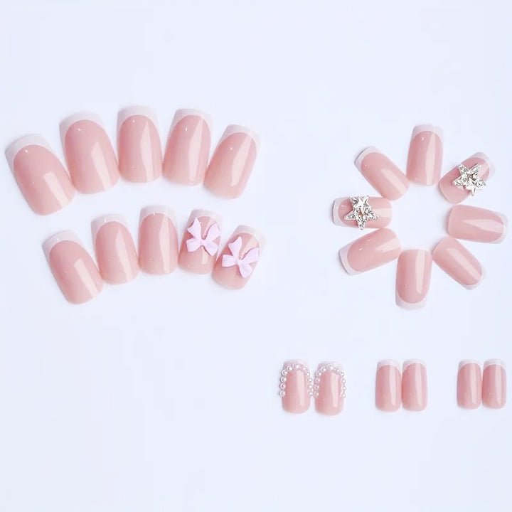 Künstliche Nagelspitzen mit glamourösem Schleifen und Strass-Design Karnz