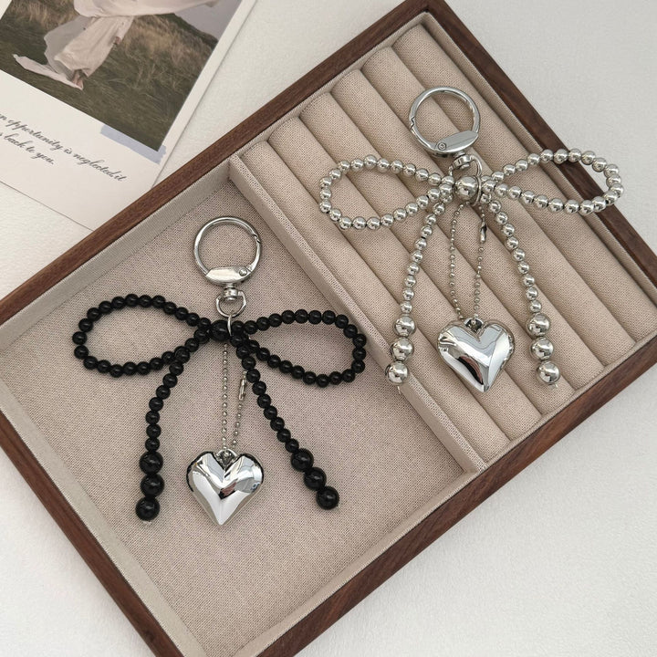 Eleganter Perlencharms-Schlüsselanhänger Karnz