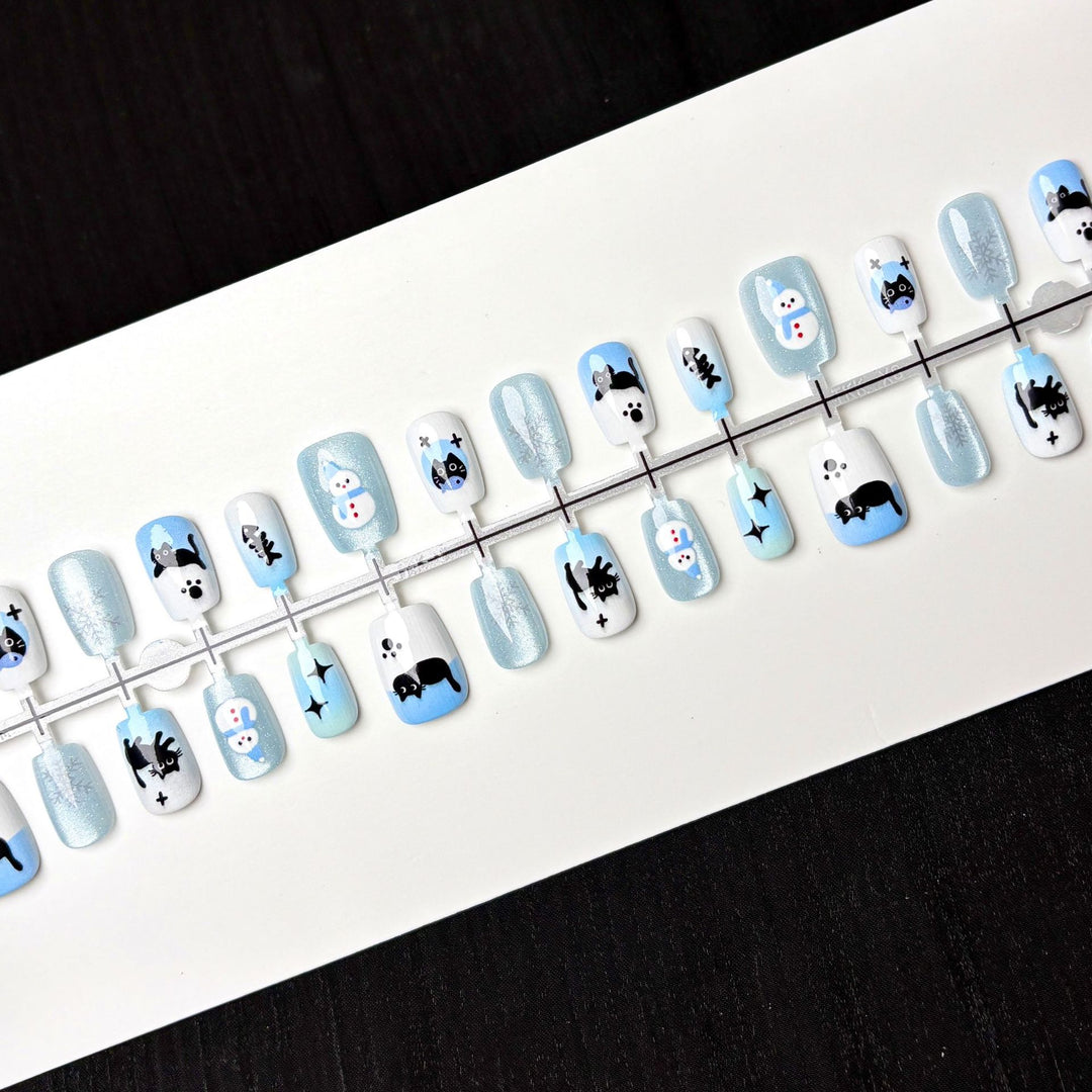 Thematisches Press-On Nagelkunstset mit Winterillustrationen