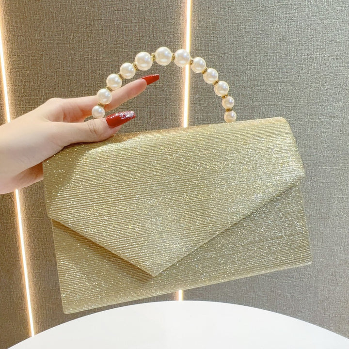 Elegante Abendtasche mit Perlengriff
