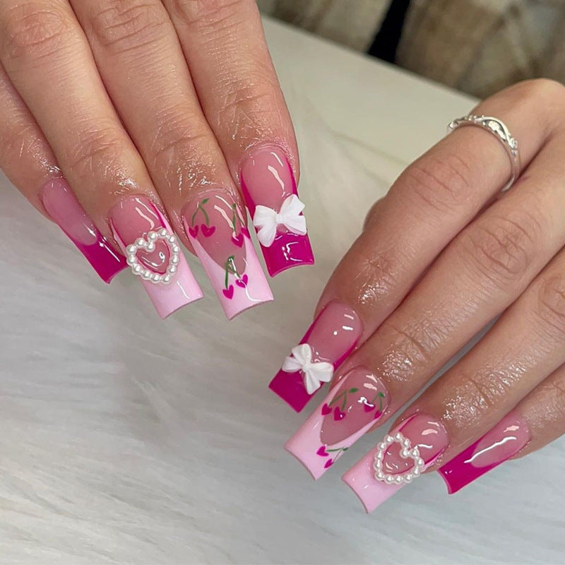 Dekoratives Press-On Nail Art Set mit 3D Herz- und Schleifenakzenten Karnz