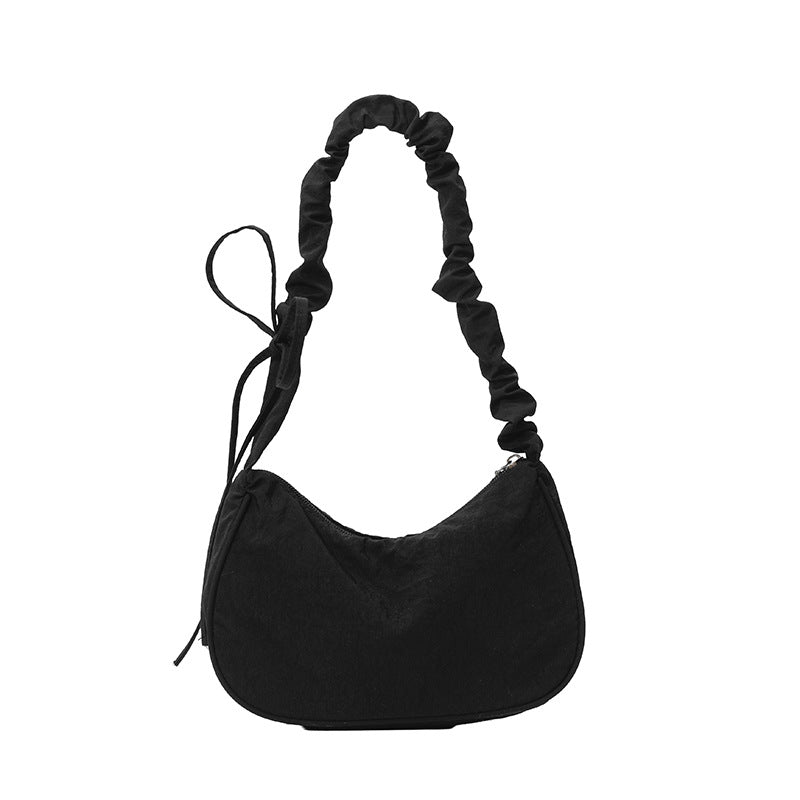 WoTexturiertes Stoff Sling Bag Karnz