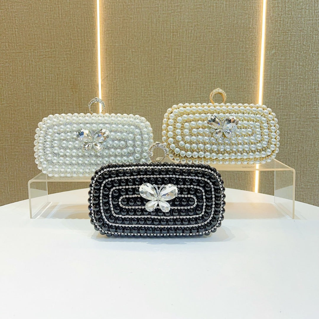 Perlenbesetzte Schmetterlings-Abend-Clutch
