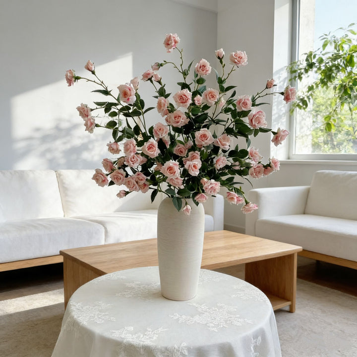 Lebensechte rosa Rosen Blumenarrangement