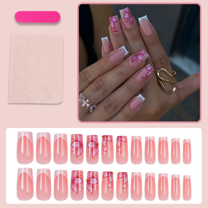 Kunstnagelset mit eleganten Blumen-Designs und Glitzerakzenten Karnz