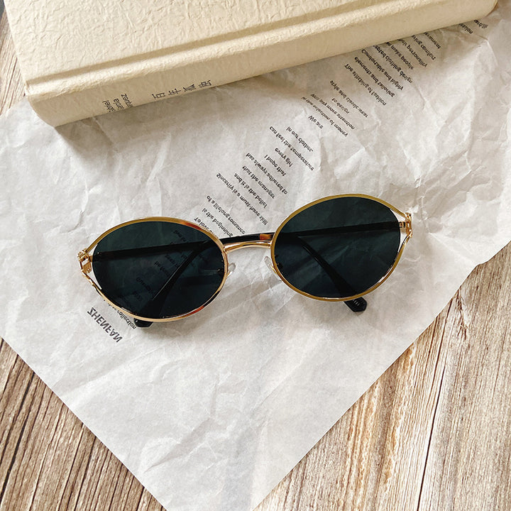 Runde Sonnenbrille mit Goldenen Akzenten Karnz