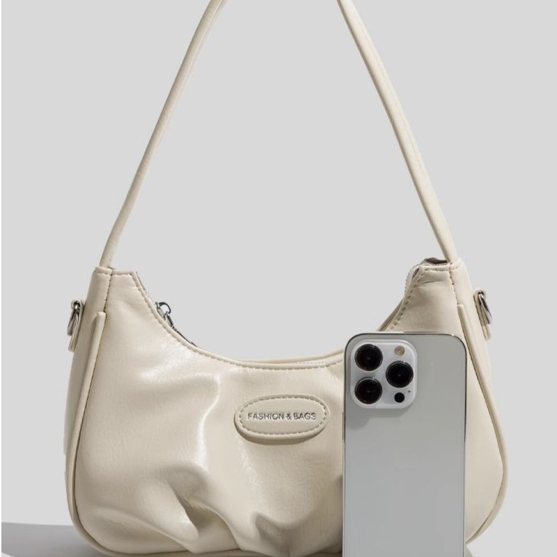 Moderne Kurven-Schultertasche Karnz